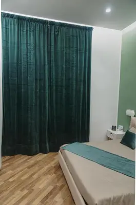 Letto o letti in una camera di La Casa dei Fiori
