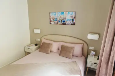 Letto o letti in una camera di La Casa dei Fiori