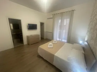 Letto o letti in una camera di da M&E rooms
