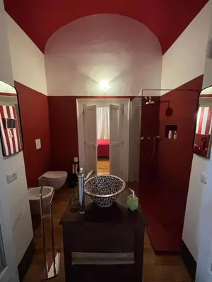 Cucina o angolo cottura di Rosso Napoli Suites