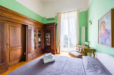 Letto o letti in una camera di Cavour Art and Museum Flat by NapoliApartments