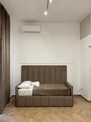 Letto o letti in una camera di Sanitá sub 31