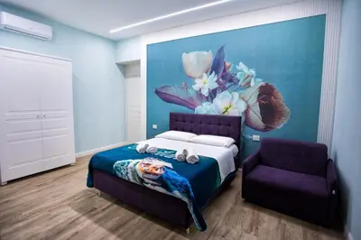 Letto o letti in una camera di PISADOG luxury BeB