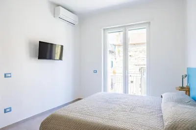 Letto o letti in una camera di Brombeis Double Bedroom Center by NapoliApartments