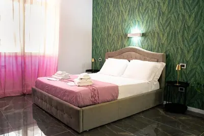 Letto o letti in una camera di Residenza Angioina