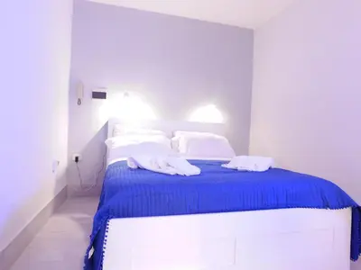 Letto o letti in una camera di Ricas Home
