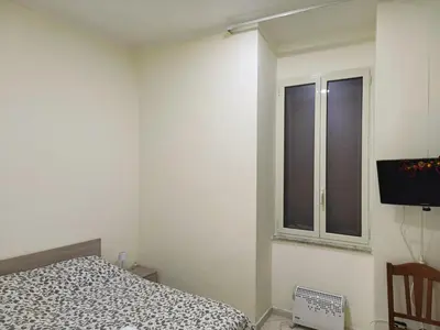 Letto o letti in una camera di Gabriella House Napoli