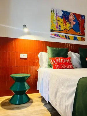 Letto o letti in una camera di Alleria suites napoli