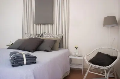 Letto o letti in una camera di Taggarb