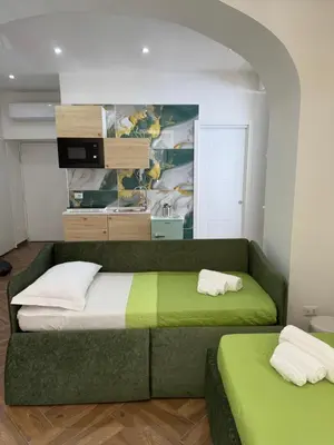 Letto o letti in una camera di La finestra di San Gennaro