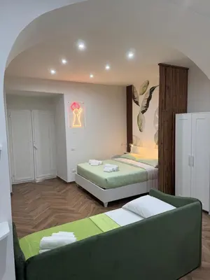 Letto o letti in una camera di La finestra di San Gennaro