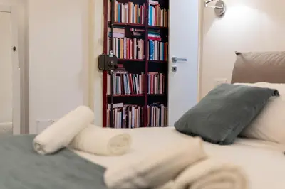 Letto o letti in una camera di Palazzo Guida al Duomo