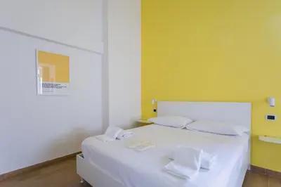 Letto o letti in una camera di Casa Wa By Dimorra