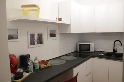 Cucina o angolo cottura di La Gioia di Napoli apartment & studios