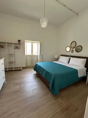 Letto o letti in una camera di Santa Chiara View