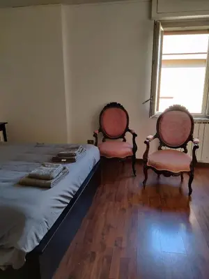 Letto o letti in una camera di An attic in Naples Historical Center