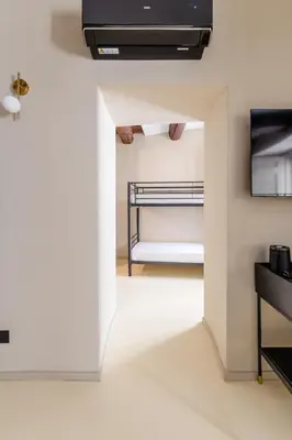 Letto o letti in una camera di The Neapolitan BB Palazzo Carafa della Spina