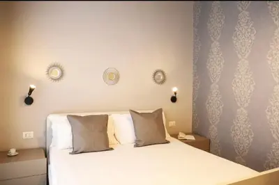 Letto o letti in una camera di Donna Consiglia Apartment