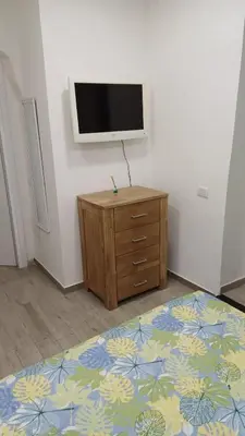 TV o dispositivi per l'intrattenimento presso Holiday House Siren Parthenos