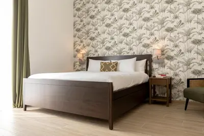 Letto o letti in una camera di Riviera Collection - Rooms and Suites