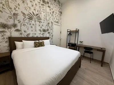 Letto o letti in una camera di Riviera Collection - Rooms and Suites