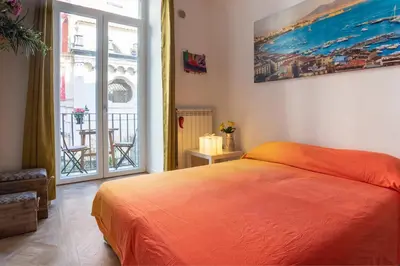 Letto o letti in una camera di L Affaccio sui Presepi Apartment