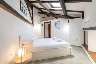 Letto o letti in una camera di Favoloso Apt con Terrazzo e Vista Mozzafiato