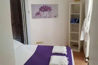 Letto o letti in una camera di La Piazzetta