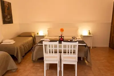 Letto o letti in una camera di Sui Tetti di Napoli