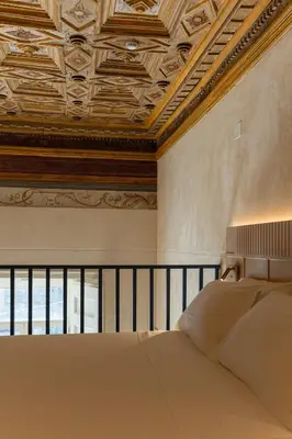 Letto o letti in una camera di Accadia Relais