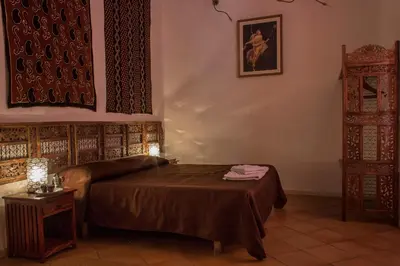 Letto o letti in una camera di diLetto a Napoli