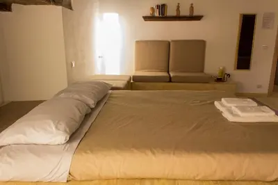 Letto o letti in una camera di Casa Latina