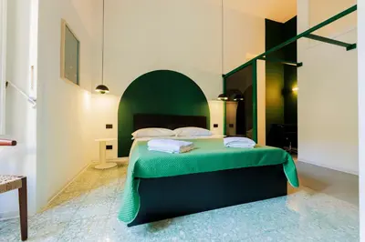 Letto o letti in una camera di Assoli House