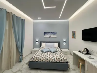 Letto o letti in una camera di B&B Nanu Napoli centro
