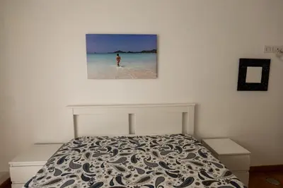 Letto o letti in una camera di Dimora Santacroce