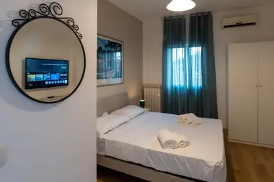 Letto o letti in una camera di Terrazza Duomo