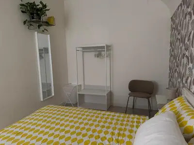 Letto o letti in una camera di Casa dell Oca Chiaia