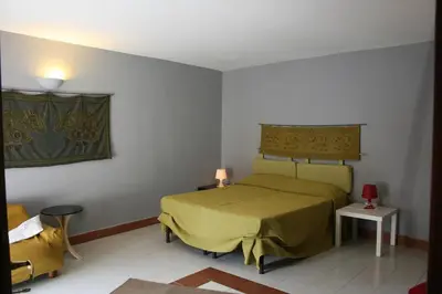 Letto o letti in una camera di Appartamento sul Teatro Romano Antico