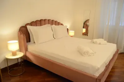 Letto o letti in una camera di Al San Carlo Rooms