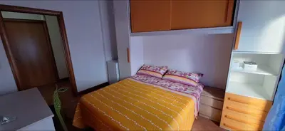Letto o letti in una camera di Domus Baiano