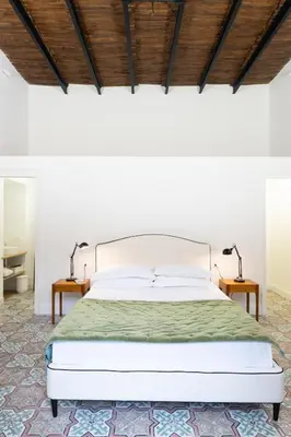 Letto o letti in una camera di Casa Crispi 51