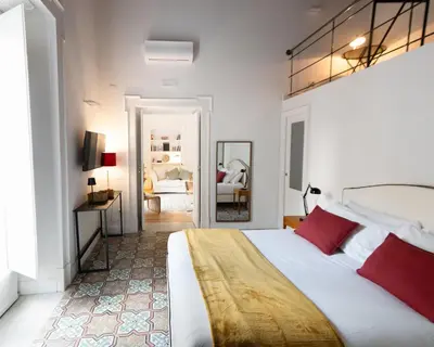 Letto o letti in una camera di Casa Blu Casa Crispi 51