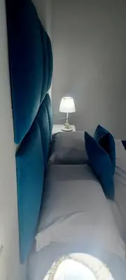 Letto o letti in una camera di Neapolis Rooms Santa Lucia