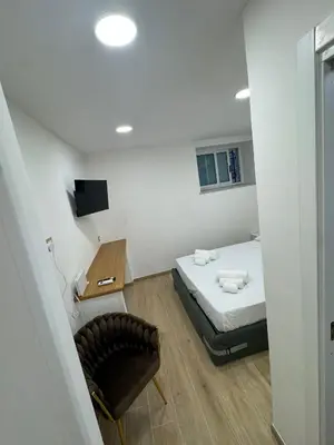 Letto o letti in una camera di Leone House