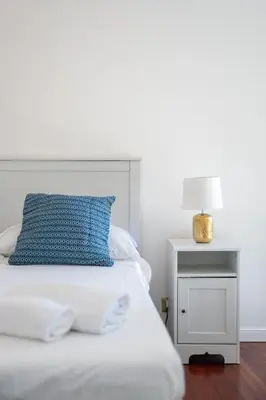 Letto o letti in una camera di Wellness HM al Corso By Dimorra