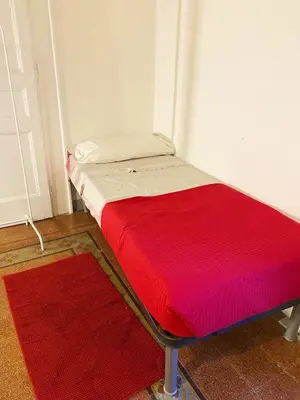 Letto o letti in una camera di Vecchia Napoli Vesuvio