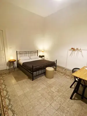 Letto o letti in una camera di Vecchia Napoli Vesuvio