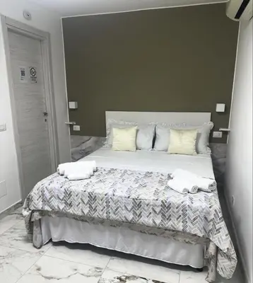 Letto o letti in una camera di Luckys Room