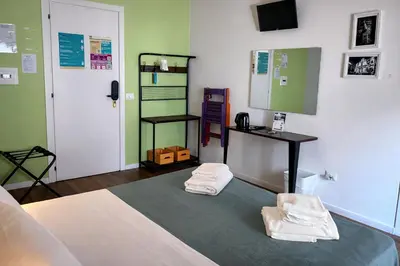 Letto o letti in una camera di NeapolitanTrips Affittacamere