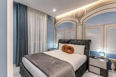 Letto o letti in una camera di Sanità Naples Central Grand Apartment for 10 Guest